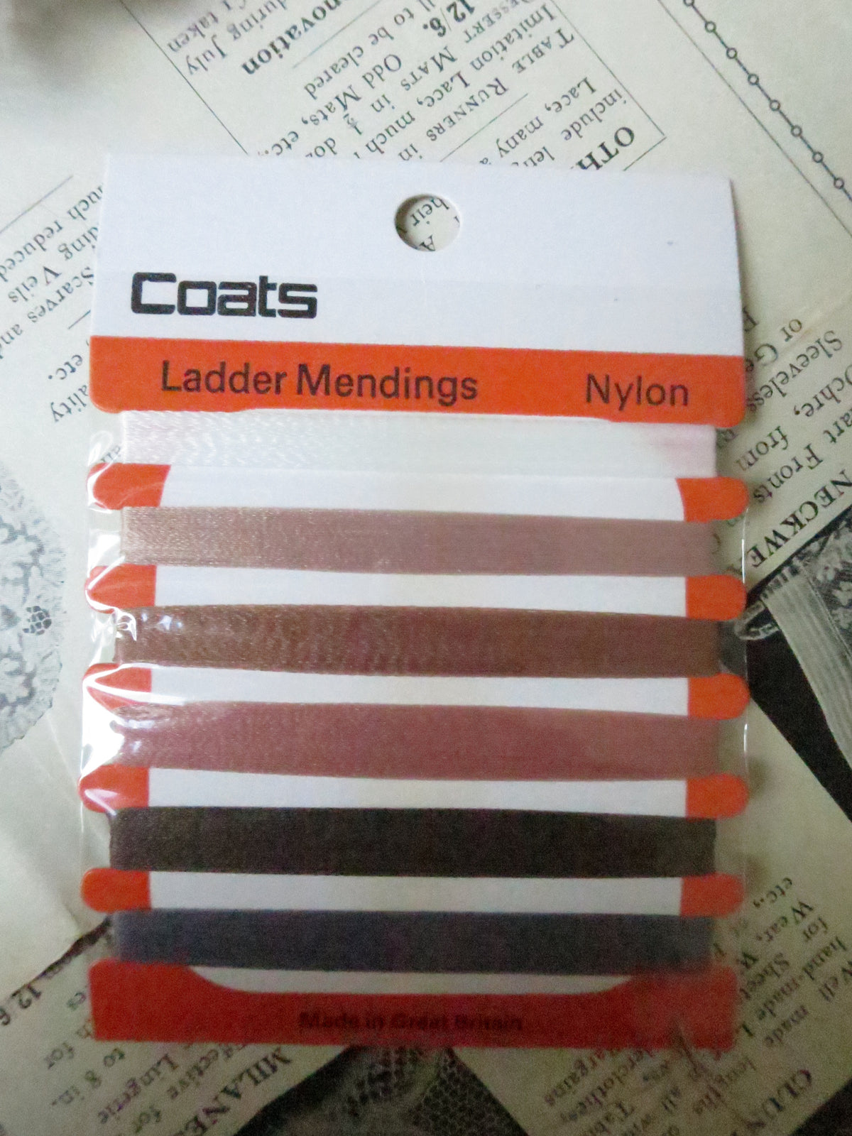 Coats nylon darning thread card showing all 6 available colours