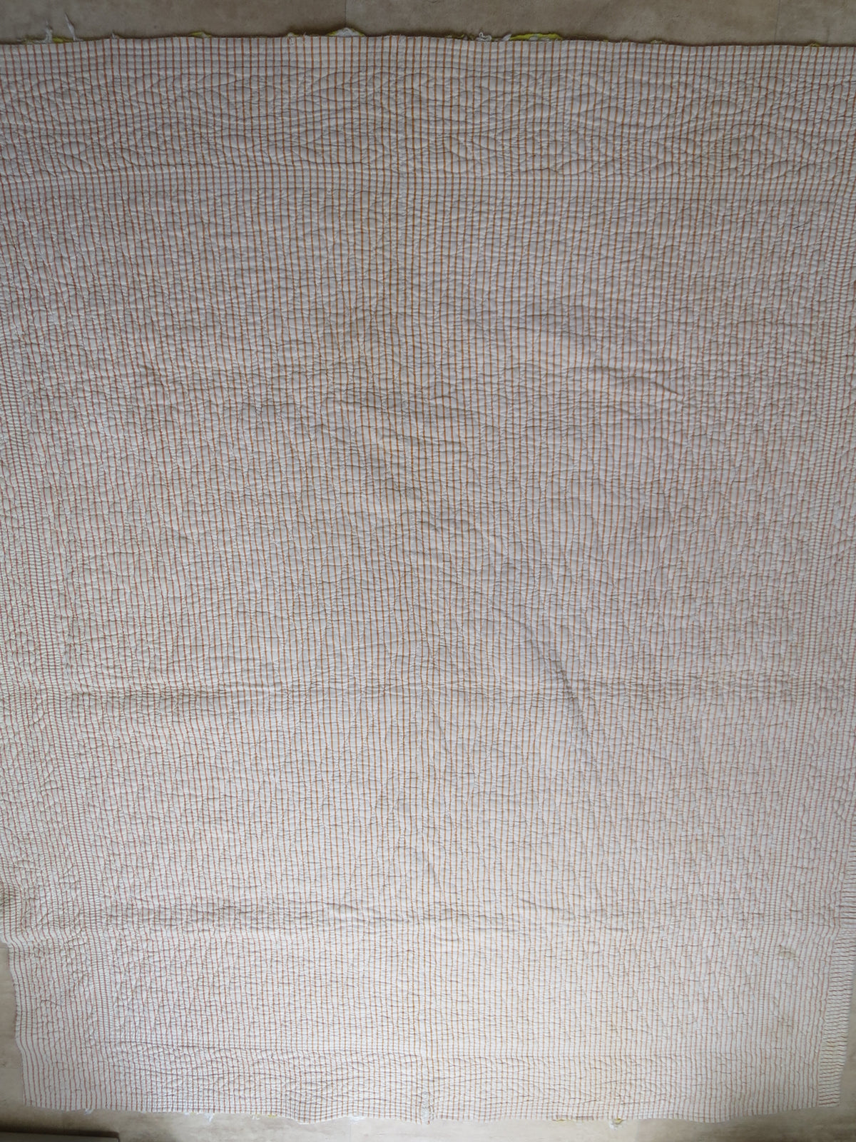 Ochre pencil-stripe reverse of the 18th-century French panel quilt
