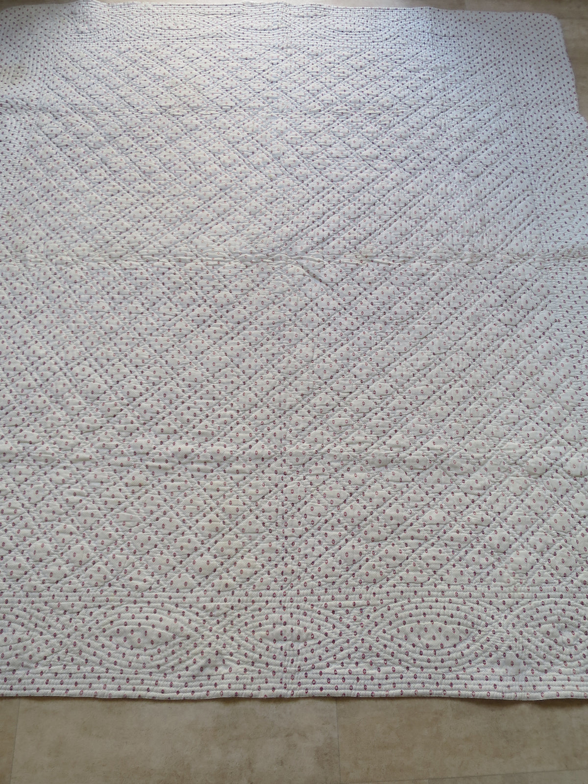 Mignonette block-print reverse of late 18th-century French piqué quilt, showing repeating geometric sprigs over a hand-executed picotage stippled ground, c.1775–1790