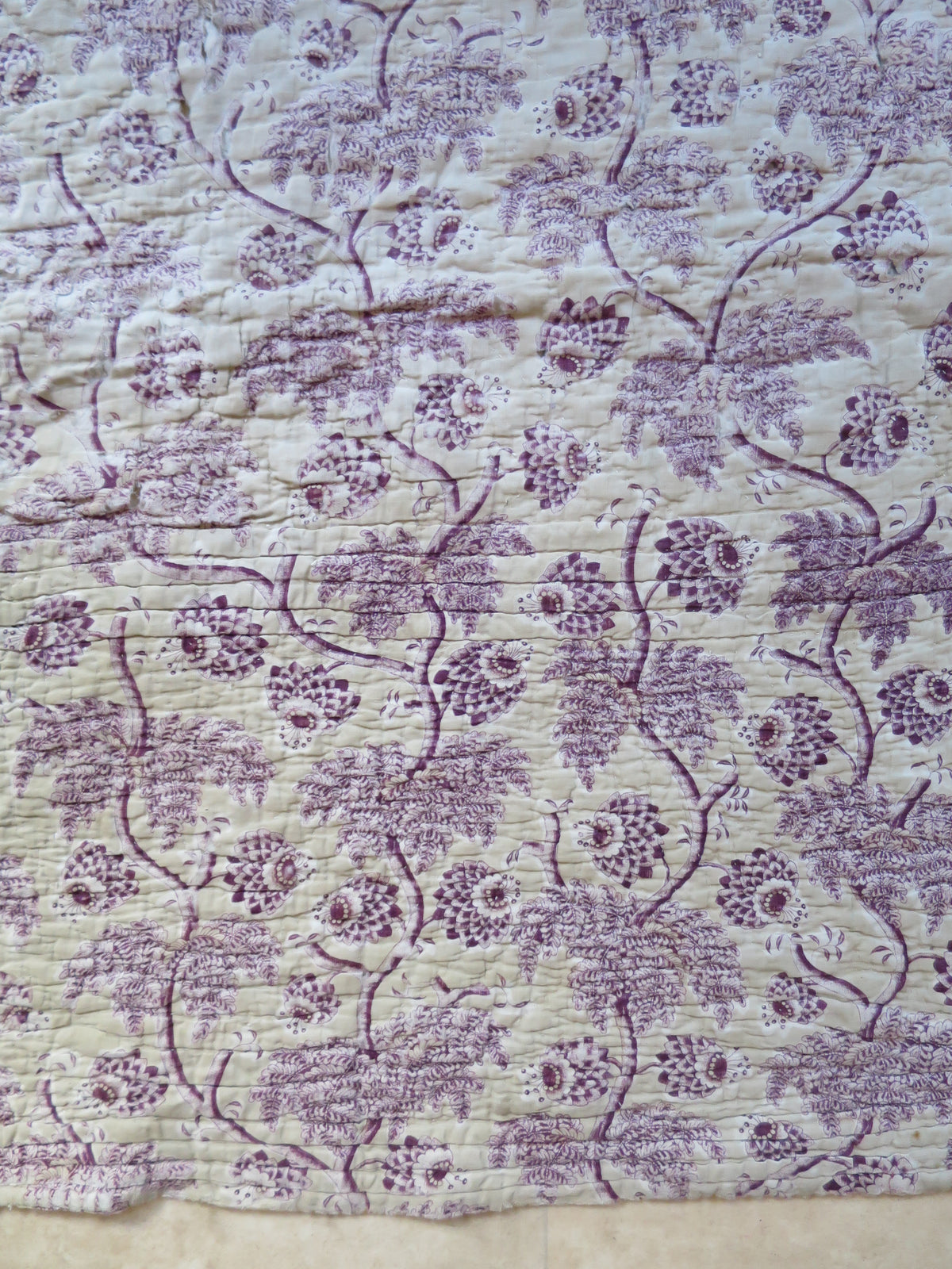 Print repeat detail on the plum block-printed front