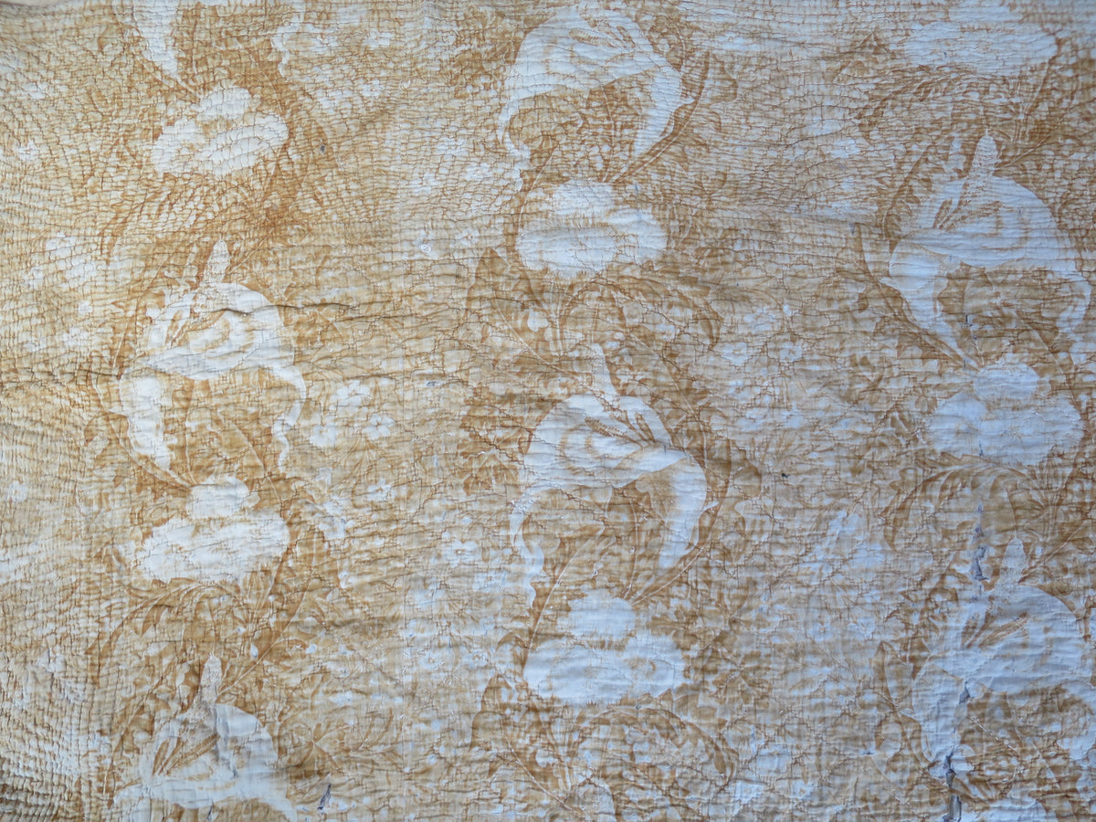 Print repeat detail on the ochre reverse