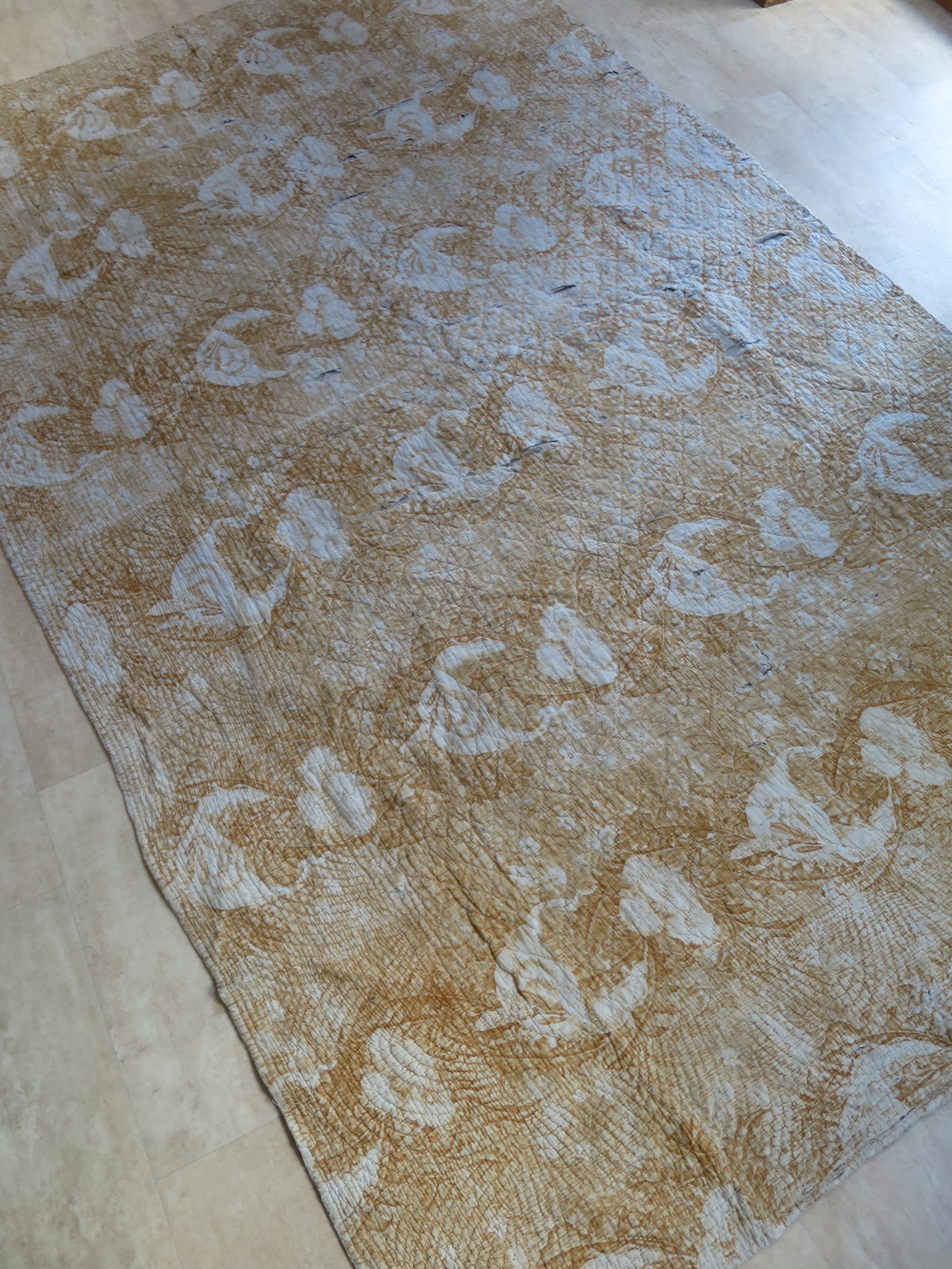 Ochre floral print reverse of the 18th-century part quilt