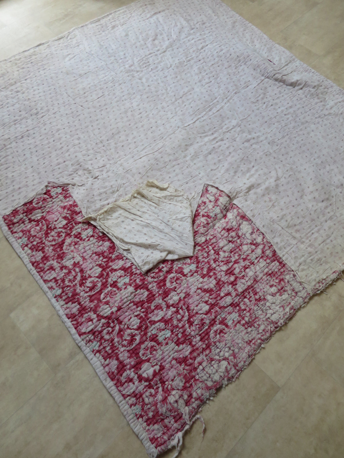 Reverse of the quilt showing the top two historic backing layers