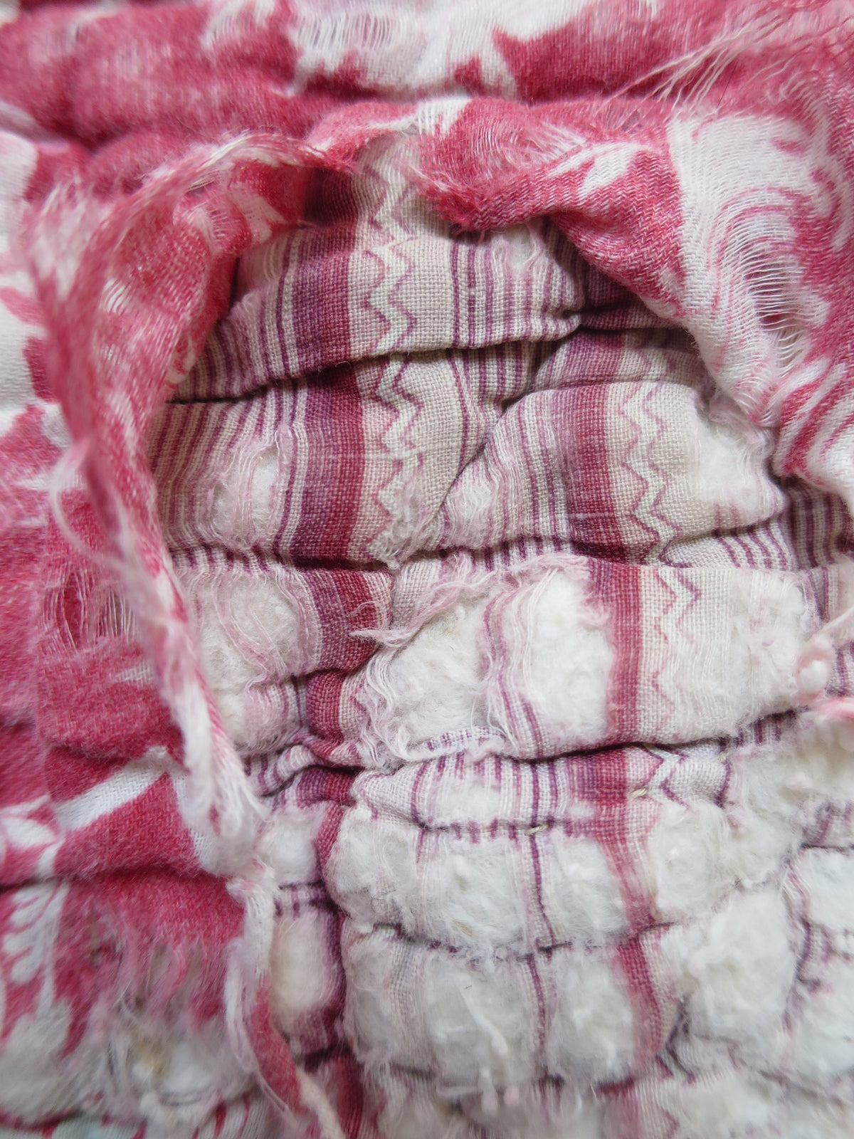 Surviving original 1780s backing fabric visible beneath the second layer