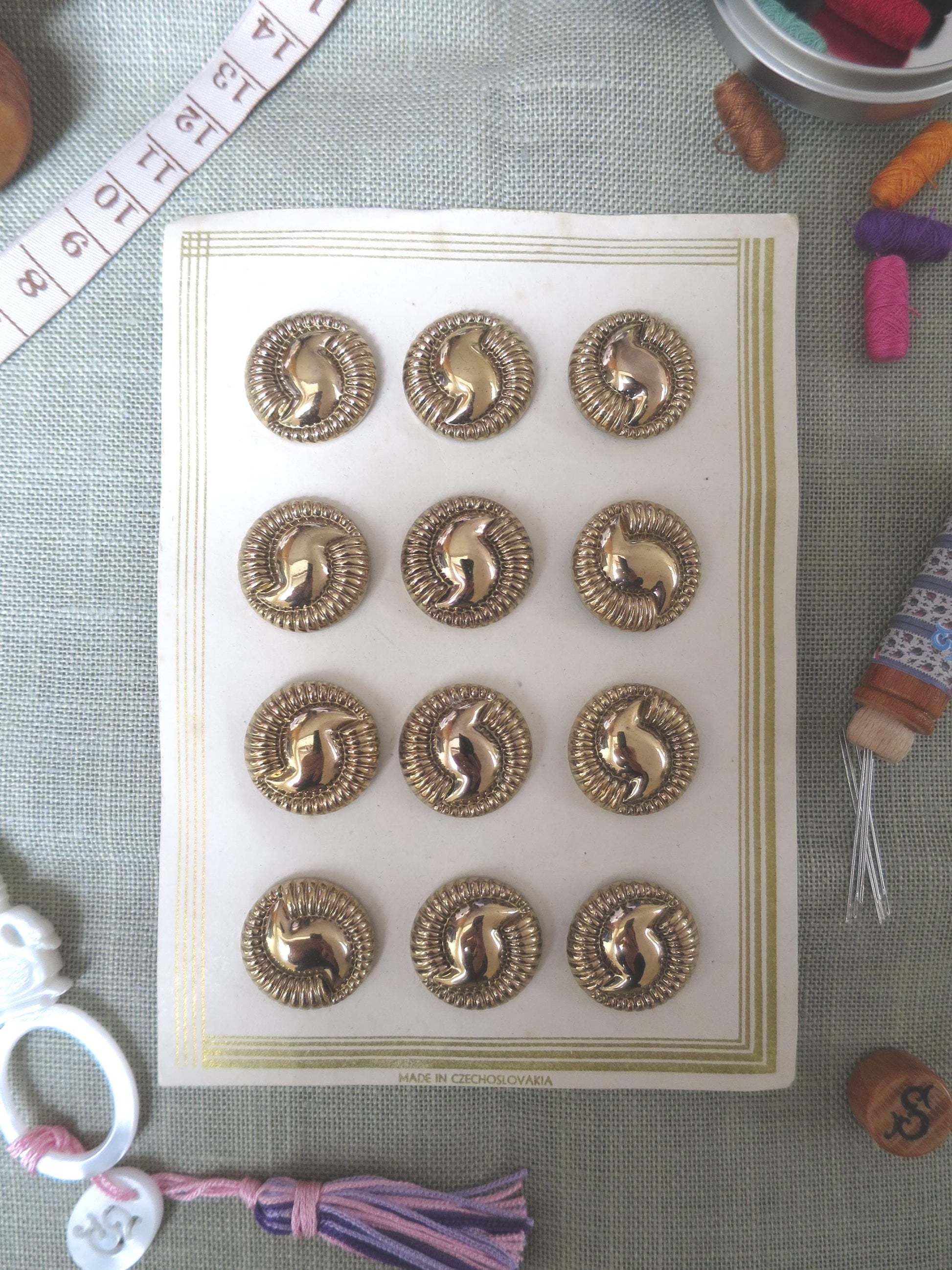 12 Antique Carded Art Deco Czechoslovakian Glass Buttons- Gold Swirl Design
