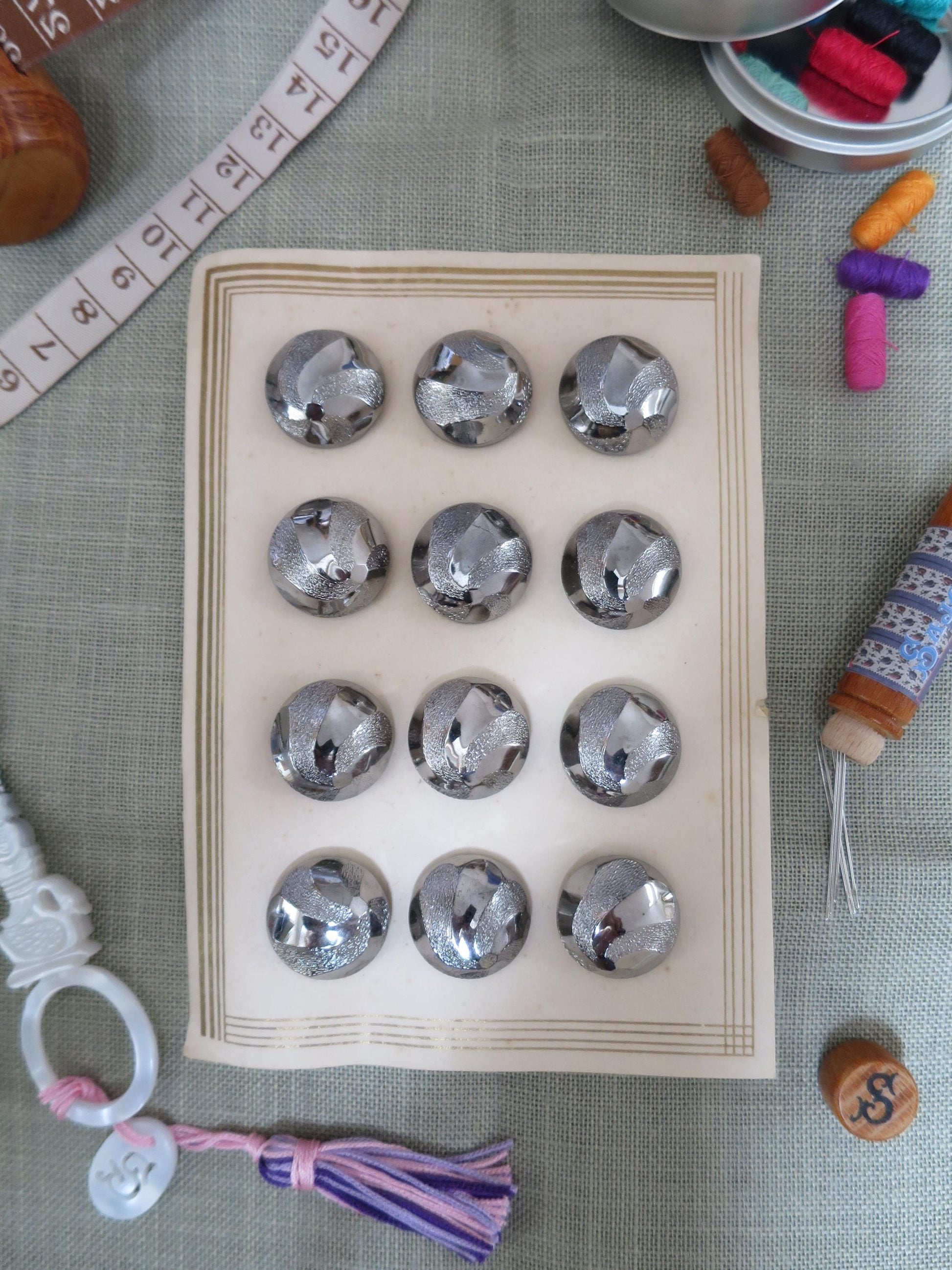 12 Antique Carded Art Deco Czechoslovakian Glass Buttons- Chrome Stippled Swirls Design