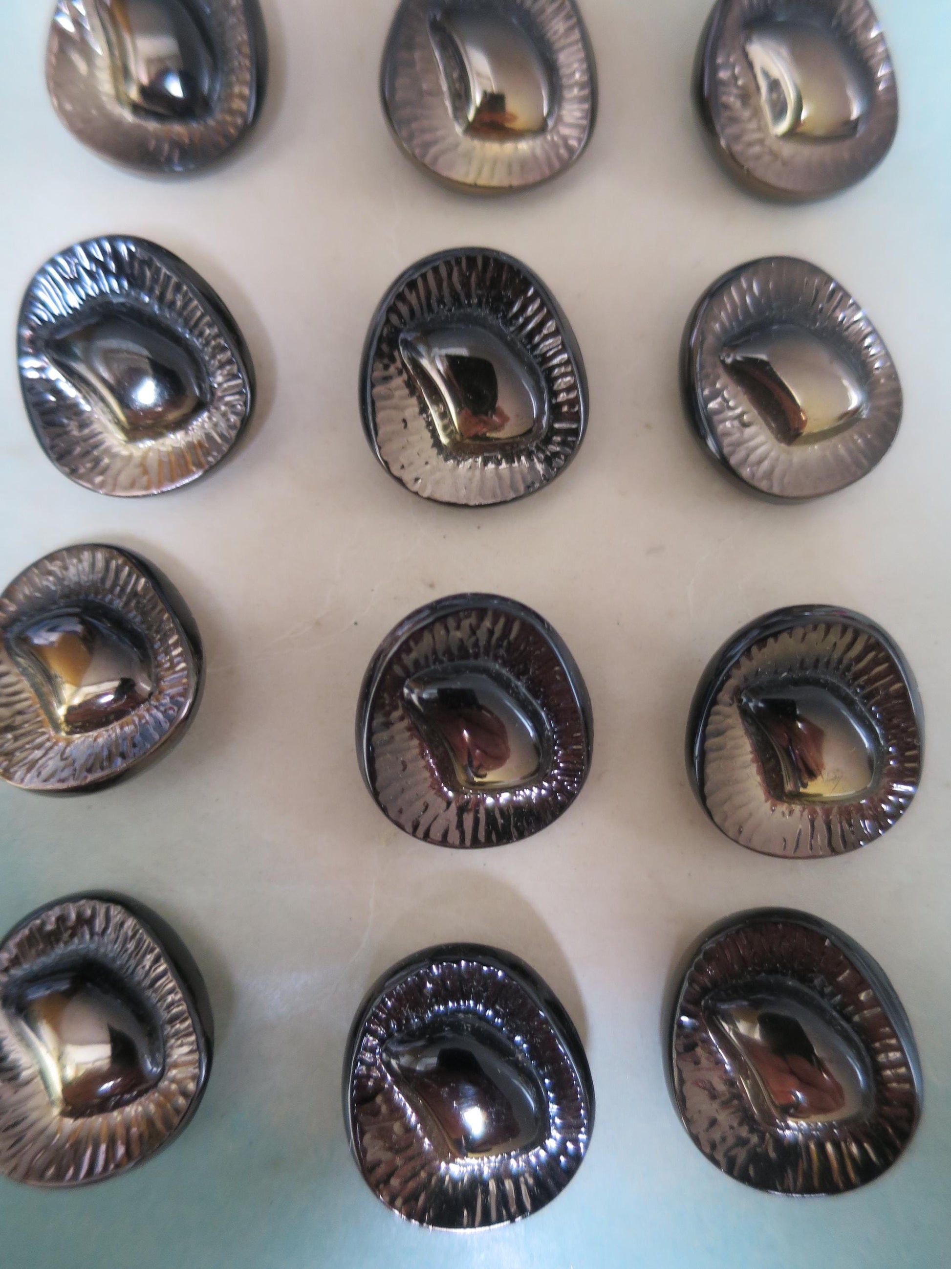 12 Antique Carded Art Deco Czechoslovakian Glass Buttons- Raised Asymetrical Design